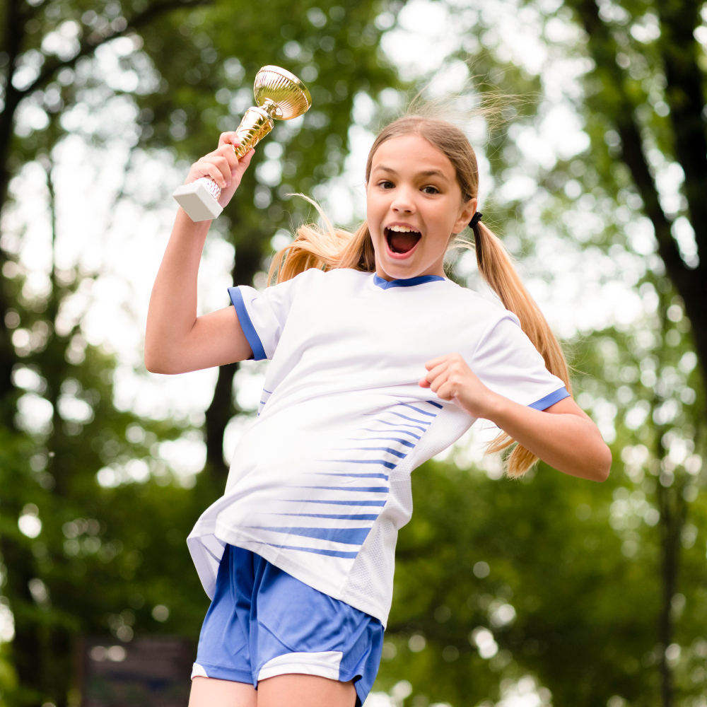 child-jumping-trophy-winner
