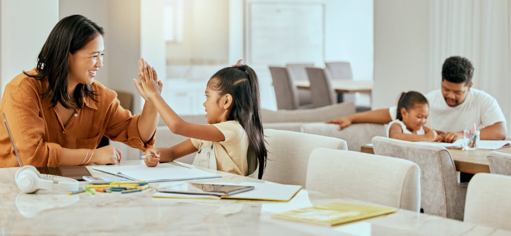 2P Blog 3 high-five-homework-parents-with-support-children-motivation-goal-education-their-house-happy-excited-girl-learning-studying-writing-school-work-with-her-mom-success