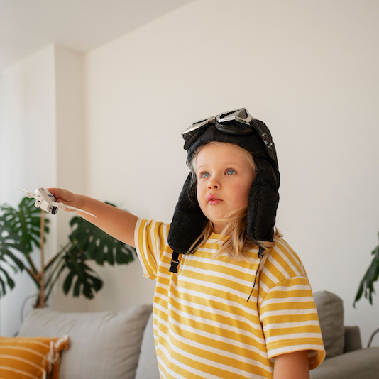 self-efficacy Girl wearing flying goggles medium shot sq